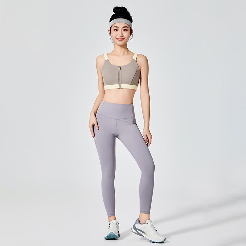 Fly Zipper ແລະ Back Hollowing Out Sports Bra